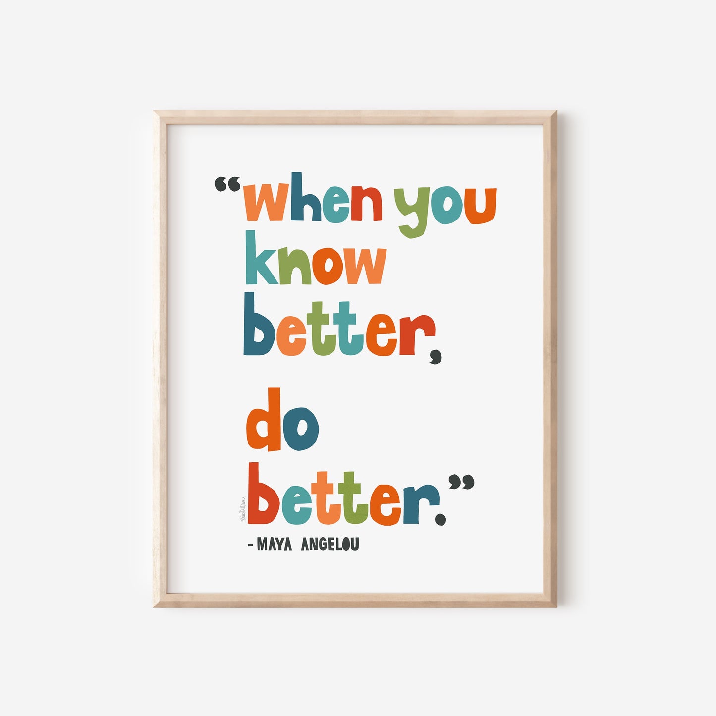 Framed print with colorful quote by Maya Angelou on a white background