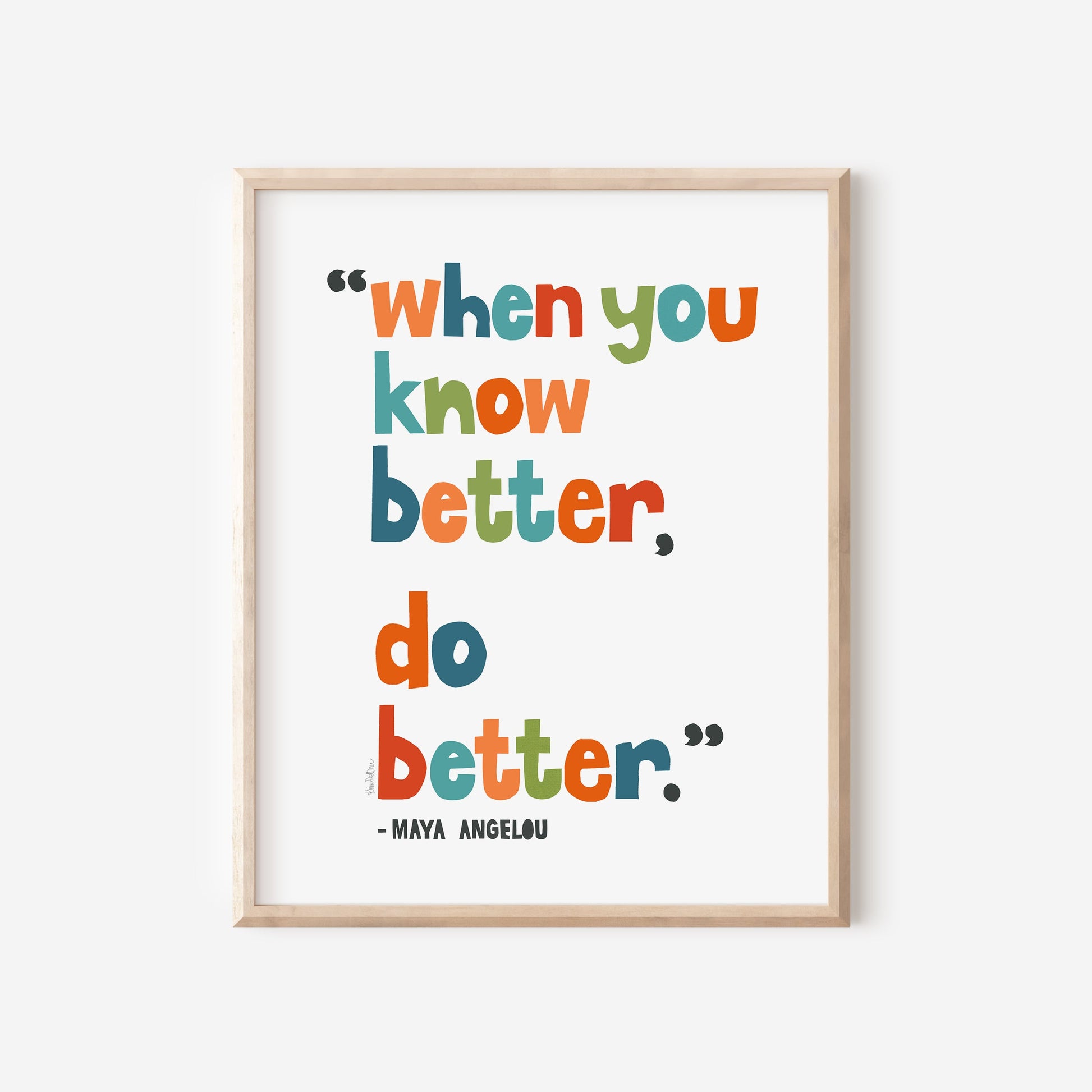 Framed print with colorful quote by Maya Angelou on a white background