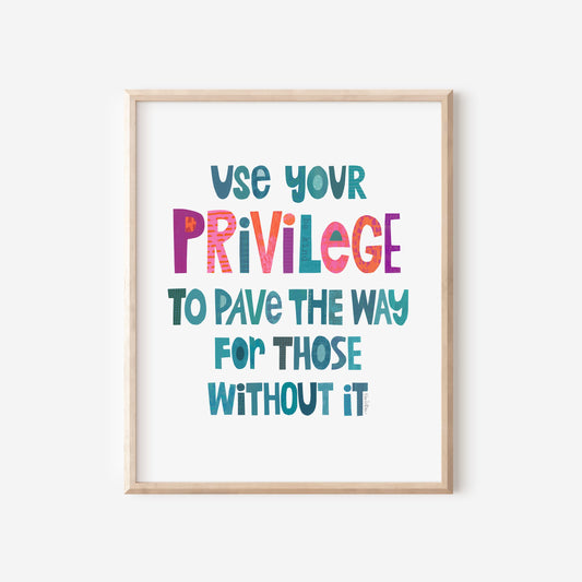 Framed poster with motivational quote 'Use your privilege to pave the way for those without it' on a white background